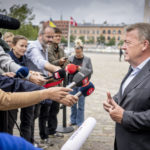 Danish foreign minister defends China trip amid criticism from opposition