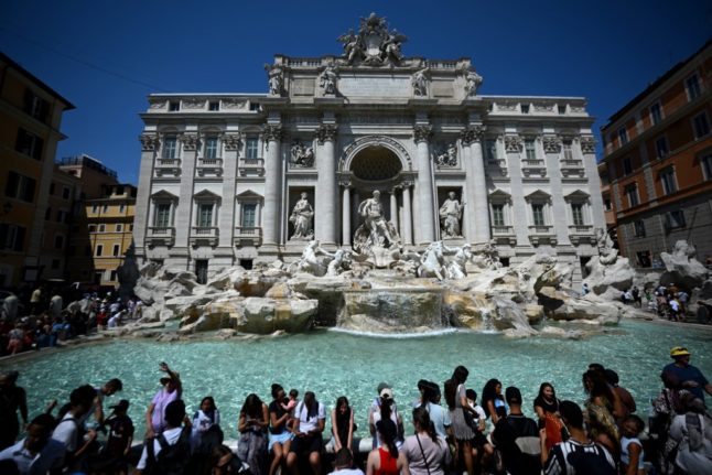 Tourists at Rome's Trevi Fountain on August 21st, 2023.