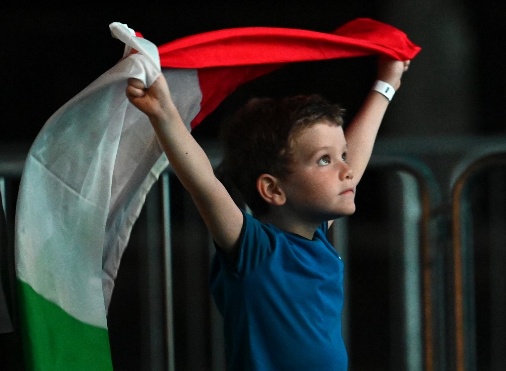 Italian flag held by boy