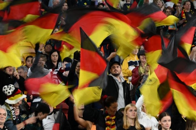 German football fans before the start of a match.