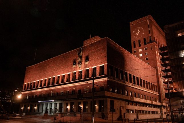 Pictured is Oslo City Hall at night.