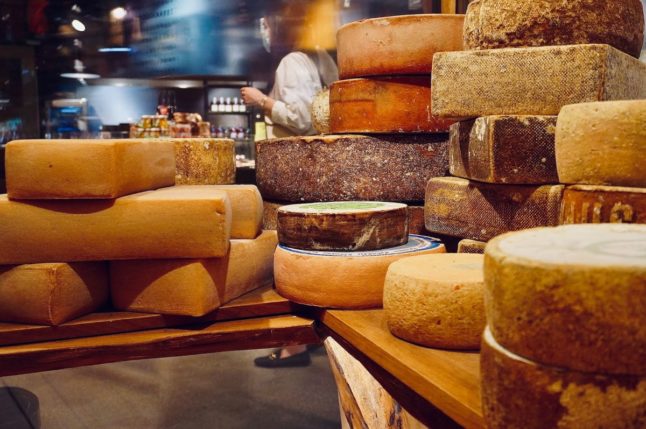 Pictured is a cheese counter.