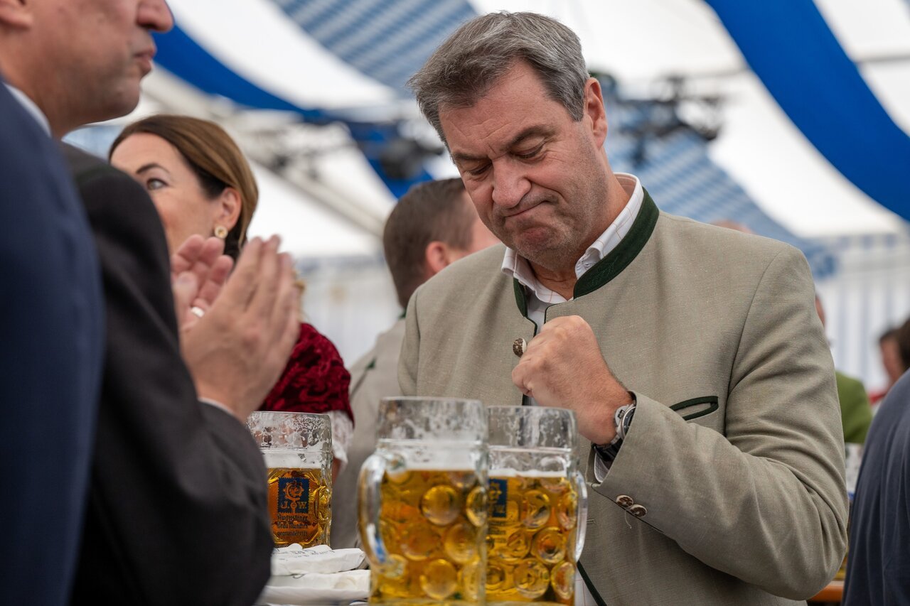 Bavarian state premier Markus Söder (CSU) greets beer on September 2nd.