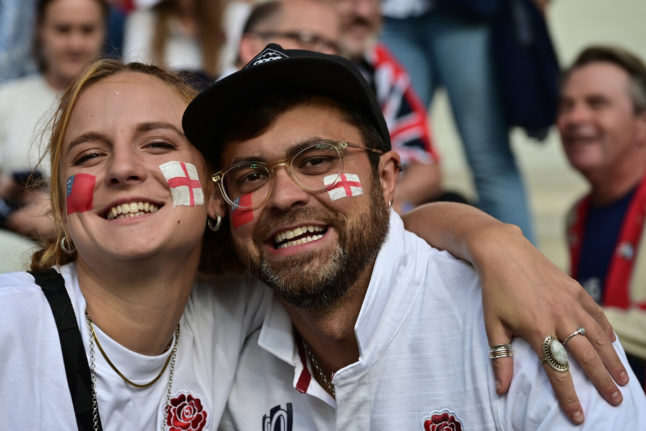England's supporters pose ahead of the France 2023 Rugby World Cup match between England and Samoa, near Lille, northern France on October 7, 2023.