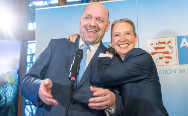 Robert Lambrou, co-chairman of the AfD in Hesse, and federal spokeswoman Alice Weidel celebrate the first forecast of the state election in Hesse