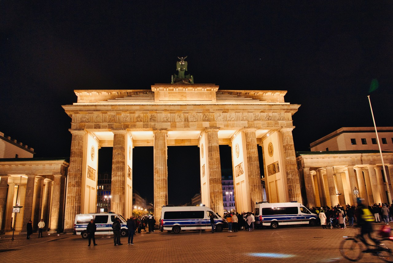 Police disperse a vigil in solidarity with Palestine at the Brandenburg Gate in Berlin.