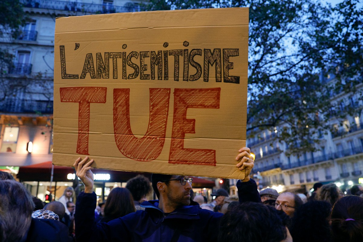 Tens of thousands march in Paris against anti-Semitism
