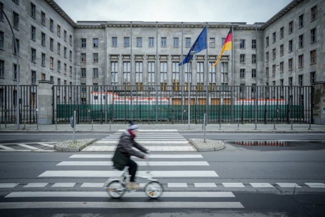 A cyclist passes the Federal Finance Ministry in central Berlin.
