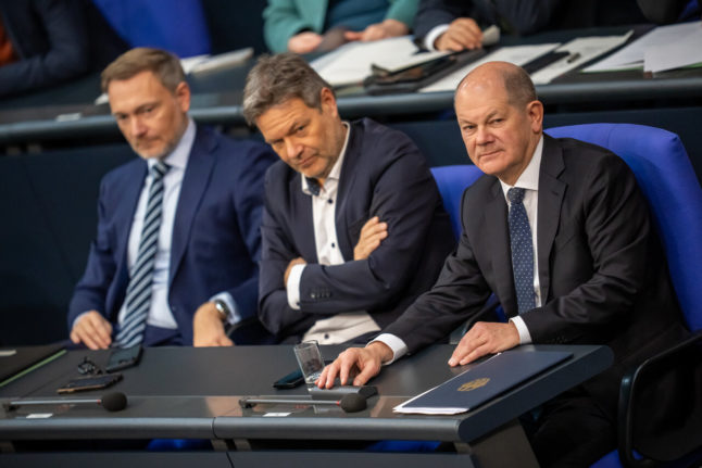 Finance Minister Christian Lindner, Economics Minister Robert Habeck and Chancellor Olaf Scholz in the Bundestag.