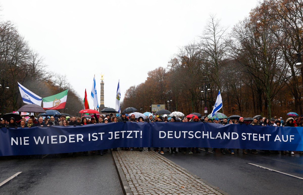People take part in a rally against anti-Semitism on December 10, 2023 in Berlin.