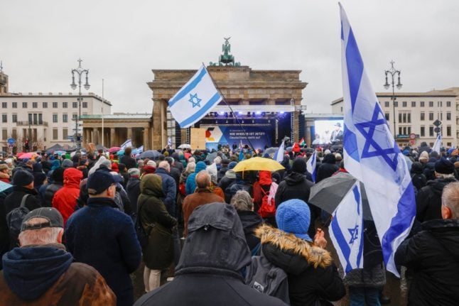 People take part in a demonstration against anti-Semitism on December 10, 2023 at Brandenburger Gate in Berlin.