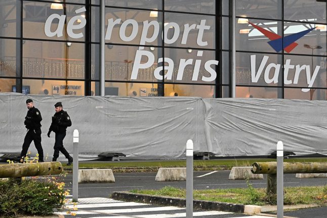 French gendarmes patrol around a terminal at Vatry airport, north-eastern France.