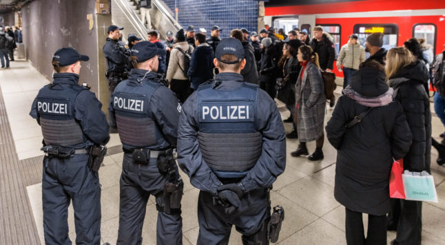 Police at Hamburg central station carrying out checks for illegal weapons.