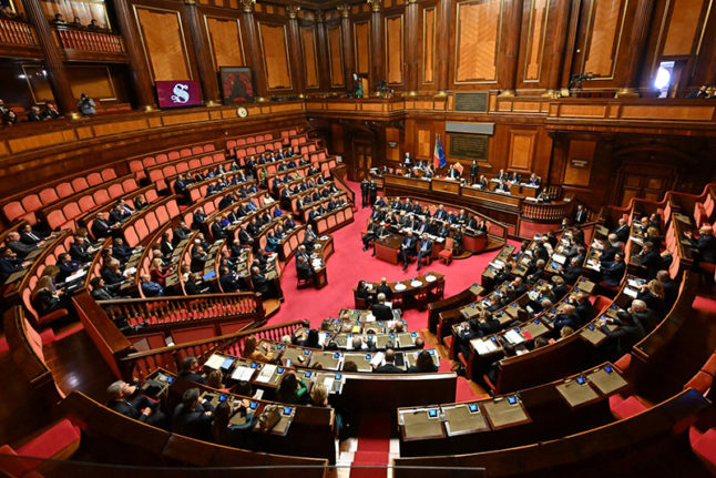 Prime Minister Giorgia Meloni and her cabinet listen to a debate at Rome's Madama Palace, seat of the Italian Senate