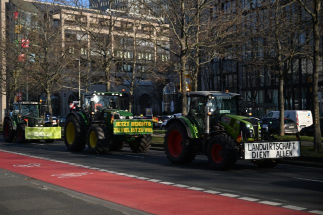 Farmers demonstrate against government plans to scrap diesel tax subsidies for agriculture vehicles in Frankfurt