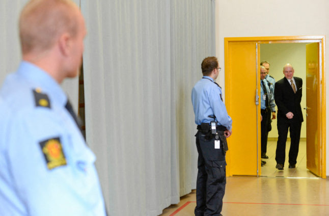 Pictured is Norwegian terrorist and mass-murderer Anders Behring Breivik entering a makeshift courtroom in Skien prison in 2019.