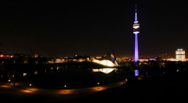 Munich's Olympic Tower is illuminated in the blue and white colours of Israel's flag, in Munich, southern Germany, on January 27, 2024, marking the Memorial Day for the Victims of National Socialism.