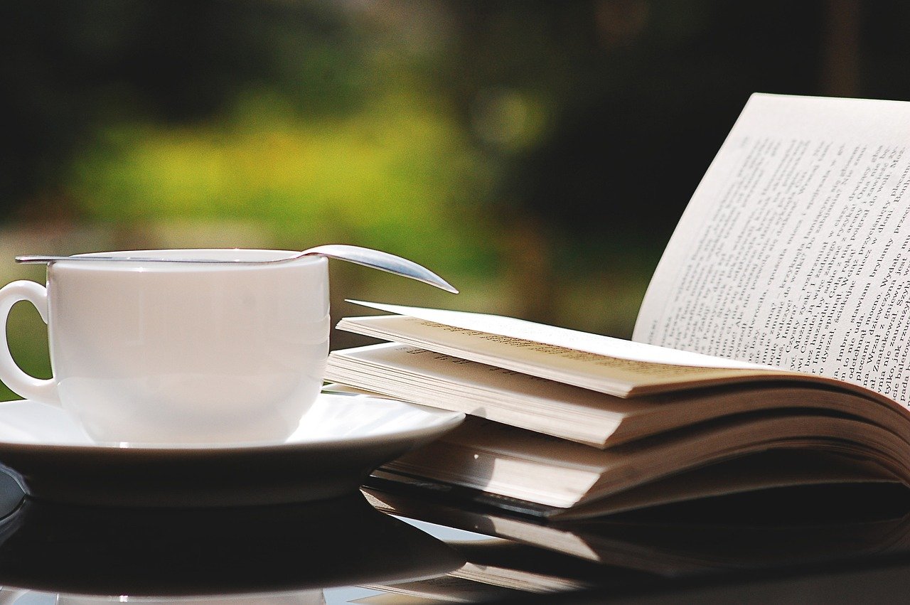 A cup of tea and a book