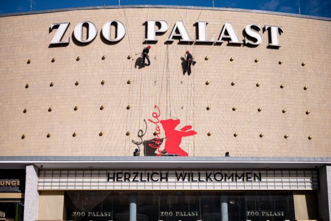 The facade of the Zoo Palast cinema displays the Berlinale bear.