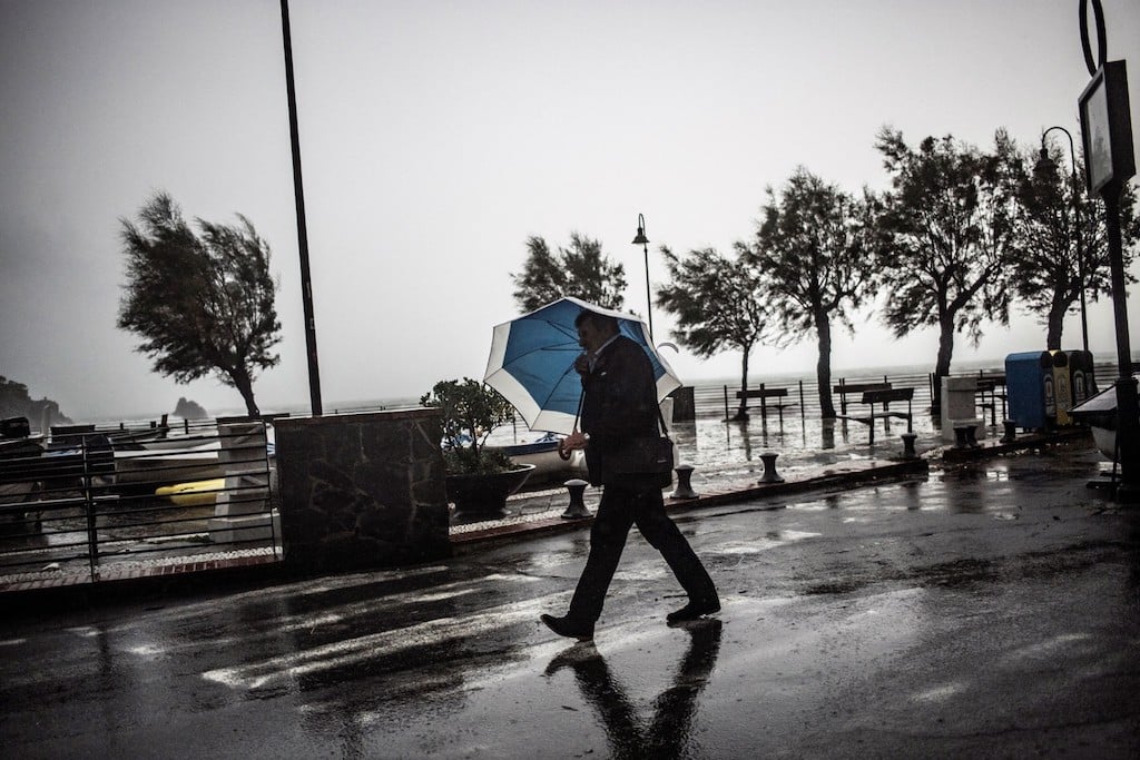 Schools closed and trains cancelled as storms batter northern Italy