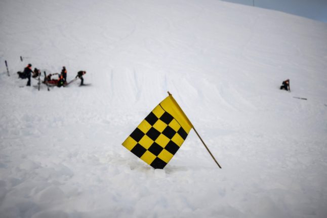 An avalanche risk flag on a mountain in France