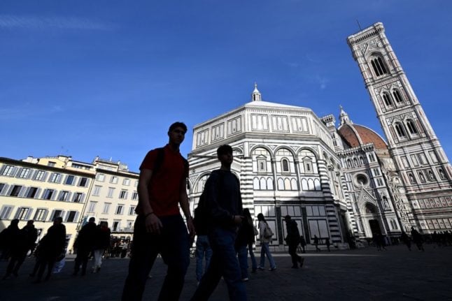 People walk at Piazza Del Duomo in Florence, on February 15, 2024.