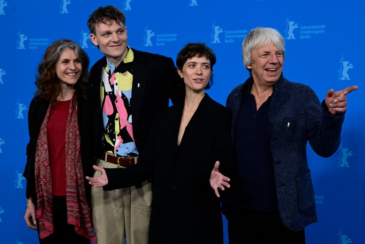 (From L) German screenwriter Laila Stieler, German actor Johannes Hegemann, German actress Liv Lisa Fries and German film director Andreas Dresen pose during a photo call for the film 'In Liebe, Eure Hilde' presented in competition at the 74th Berlinale