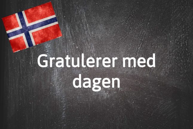 Norwegian word of the day on a chalkboard.