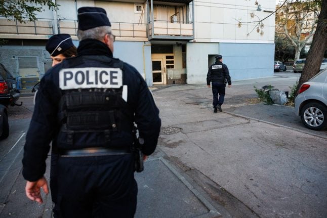 Police officers are seen in the northern district of in Marseille
