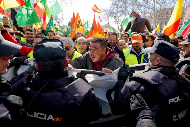 Nine police hurt in clashes during farmers’ protest in Spain