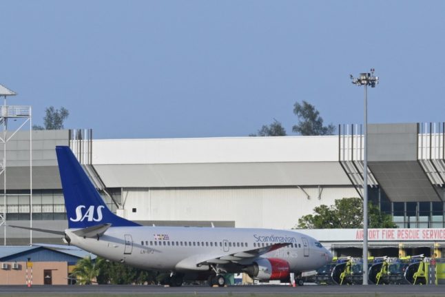 A Scandinavian Airlines (SAS) Boeing 737-700 aircraft is seen parked at Langkawi International Airport