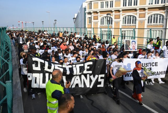 Hundreds march in Paris suburb after teen killed in police chase