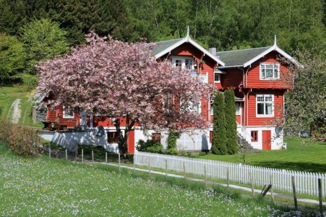 Pictured is a house in Flåm.