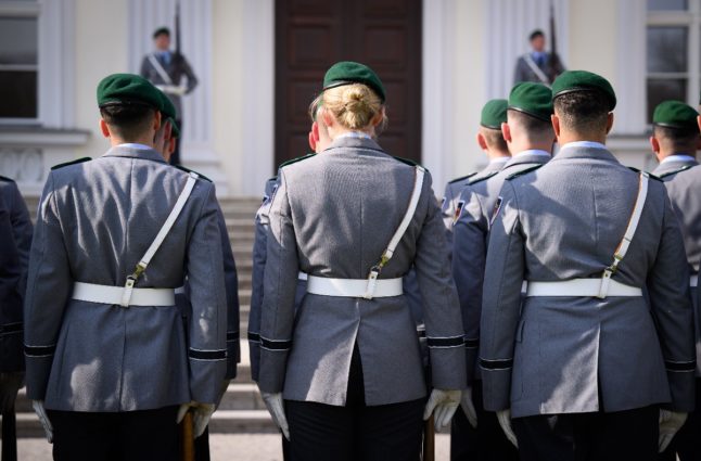 Soldiers from the German Bundeswehr or army outside n front of Bellevue Palace in Berlin during an event.