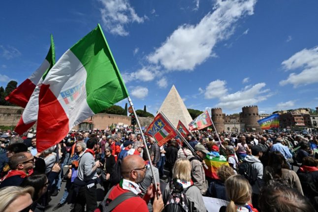 People gathered by Rome's Cestia Pyramid to celebrate Italy's Liberation Day on April 25th 2023.