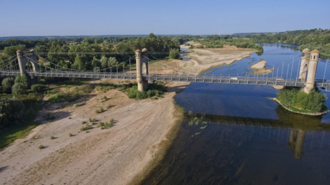 Sand banks visible along the low-running Loire river in France during the drought in August 2023