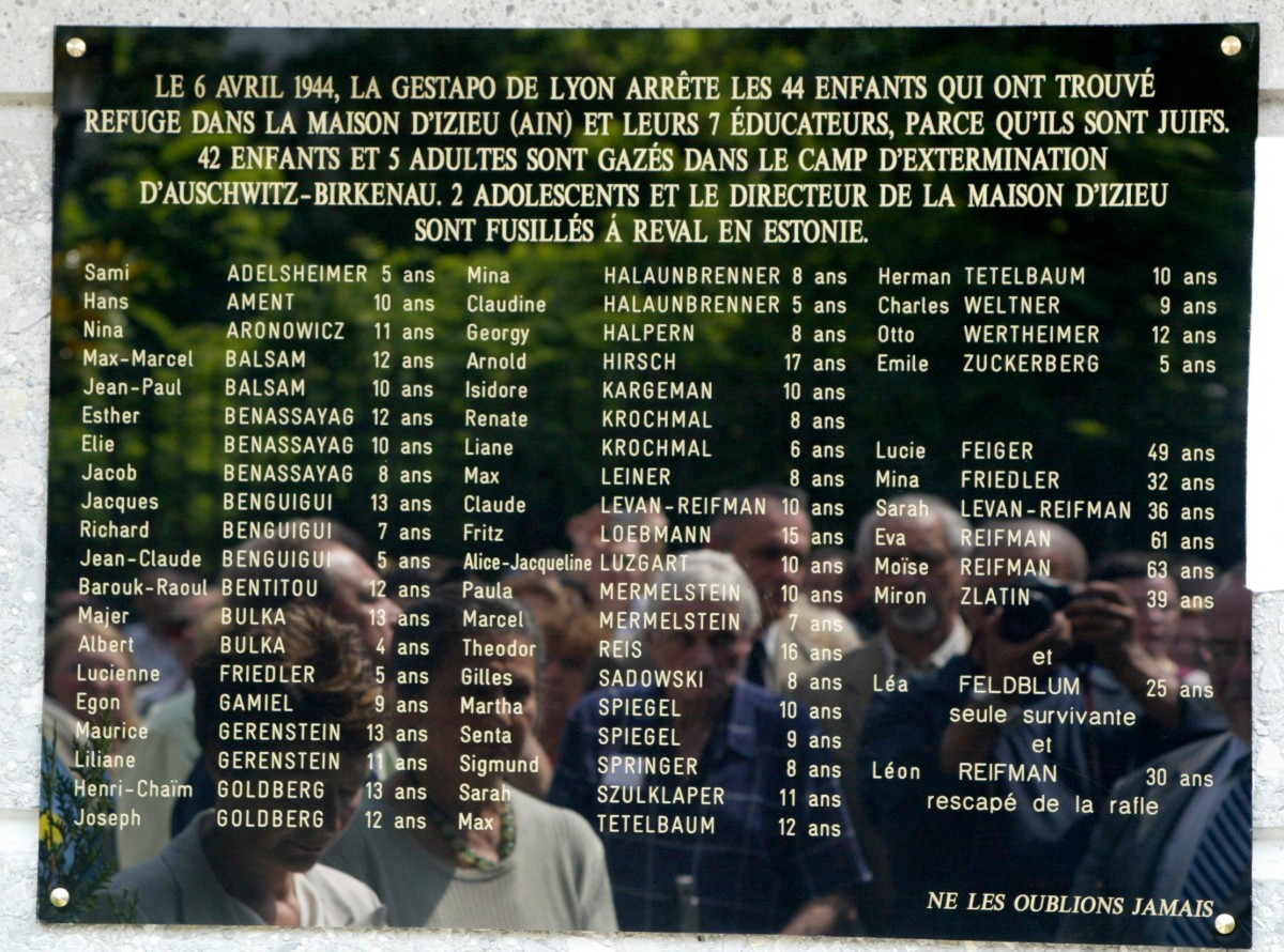 This file photo shows a commemorative plate with the names of the 44 Jewish children and their 7 teachers who were deported on April 6, 1944 by Nazi forces.