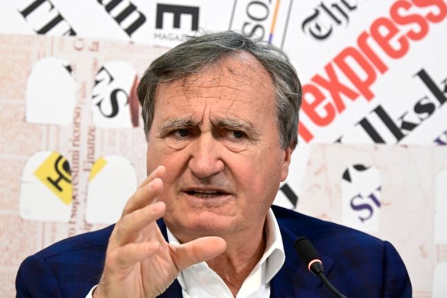 Venice's Mayor Luigi Brugnaro gestures as he addresses reporters at the Foreign Press Association in Rome in April 2024