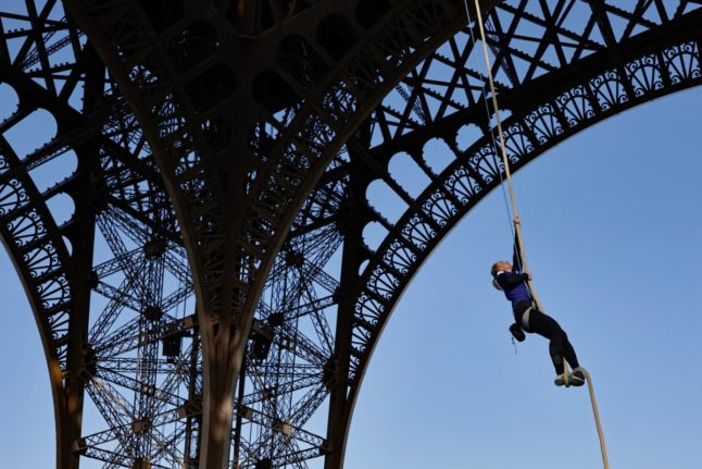 French athlete breaks world record after rope climbing Eiffel Tower