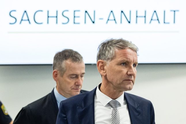 German far-right politician of the Alternative for Germany (AfD) Björn Höcke and his lawyer Ralf Hornemann arrive for a session of his trial over the alleged use of Nazi phrases, at the regional court in Halle, eastern Germany on April 23, 2024.