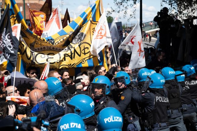 Riot police and protestors in Venice