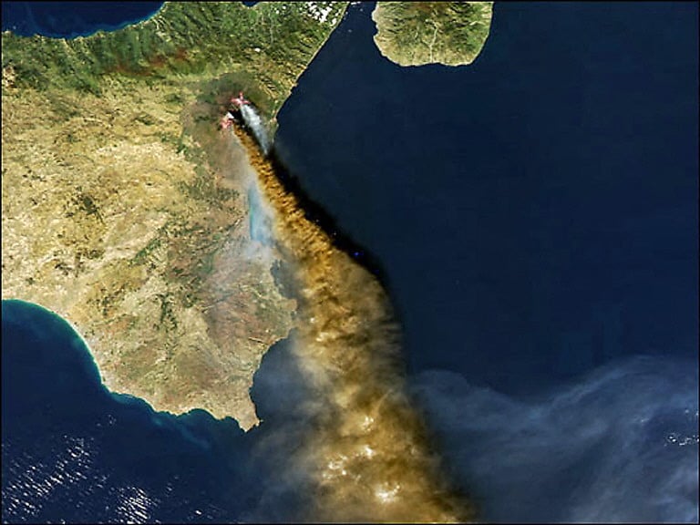 A NASA satellite photo shows the ongoing eruption of Europe's largest, Mount Etna, on the island of Sicily in October 2002