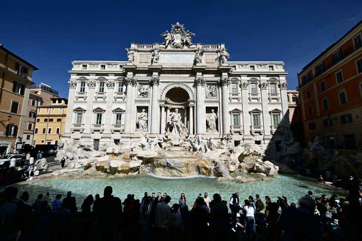 Tourists around Rome's Trevi Fountain