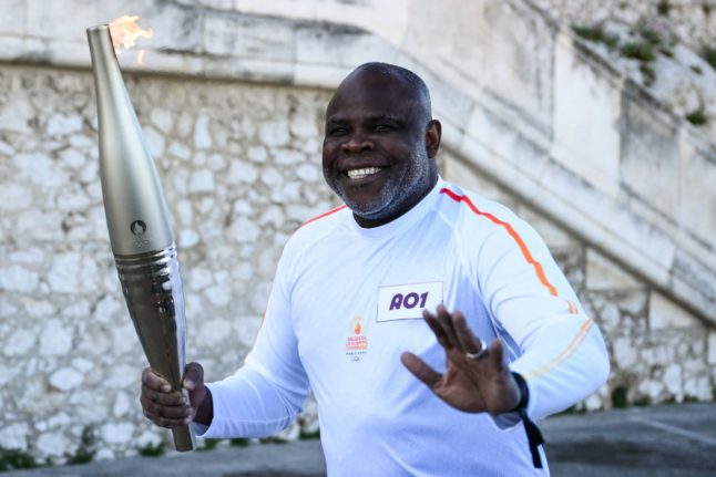 Paris Olympic flame begins relay across France