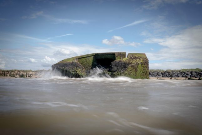 A partially submerged bunker from the World War Two Atlantic Wall near Asnelles, Normandy