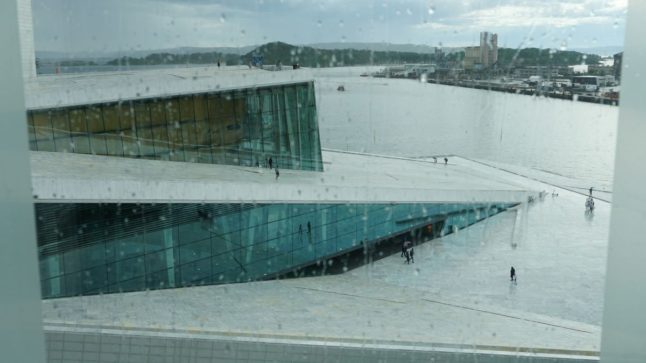 Pictured is the Oslo Opera House in the rain.