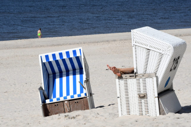 A person lies in a beach basket on Sylt