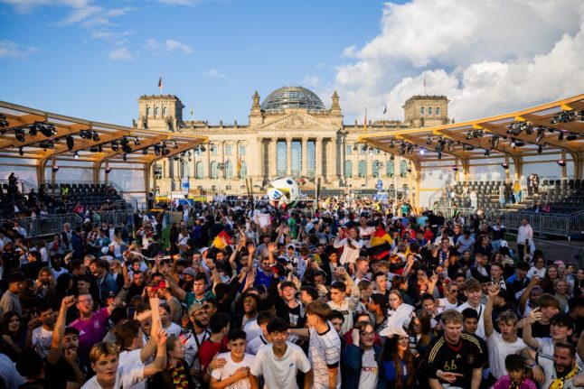 Fans watch the Germany-Hungary game at a screening outside the Reichstag in Berlin.