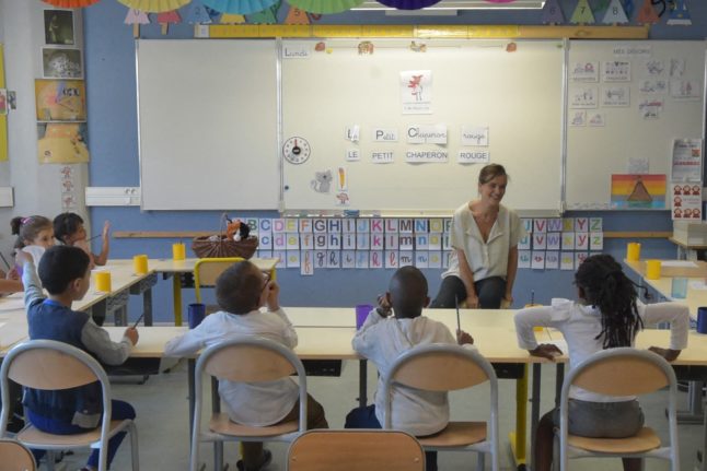 A teacher with her class at a school in Toulouse