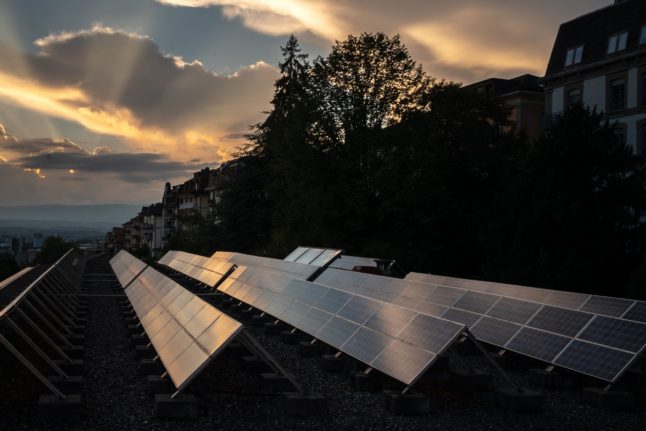 This photograph shows solar cell panels mounted on a rooftop in Lausanne in Switzerland.